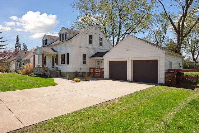 view of front of house with an attached garage, driveway, and a front yard