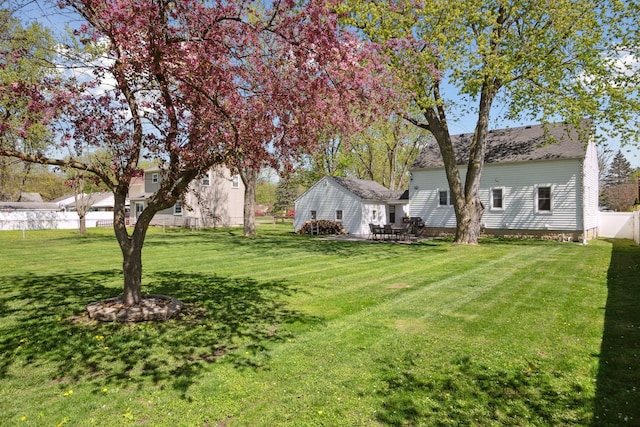 view of yard with fence