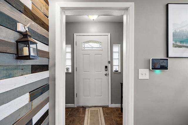 entrance foyer featuring baseboards