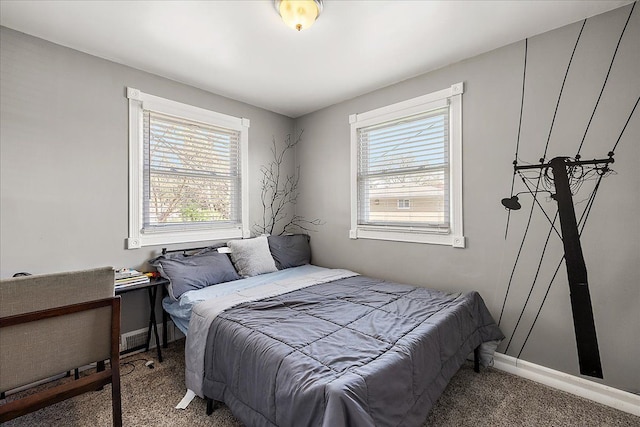 carpeted bedroom with baseboards