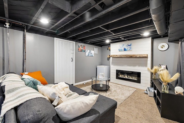 carpeted living area featuring a fireplace