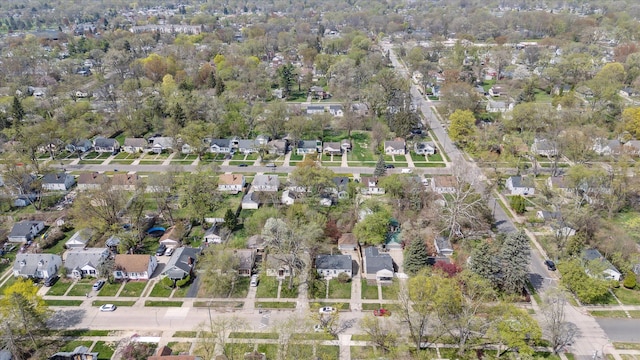 aerial view of property's location featuring nearby suburban area