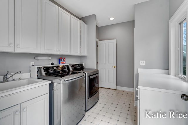 5575 Beechmont Rd, Whitehall, MI 49461 - laundry area featuring a sink, washer and dryer, cabinet space, baseboards, and recessed lighting