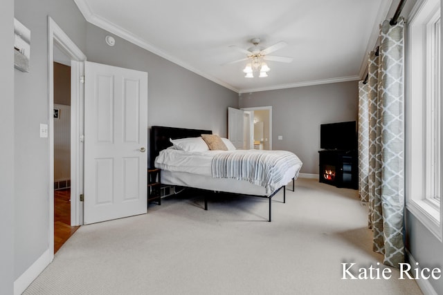 5575 Beechmont Rd, Whitehall, MI 49461 - carpeted bedroom with crown molding, baseboards, and ceiling fan