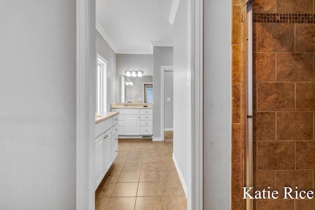 5575 Beechmont Rd, Whitehall, MI 49461 - full bath featuring crown molding, tile patterned floors, a tile shower, baseboards, and two vanities
