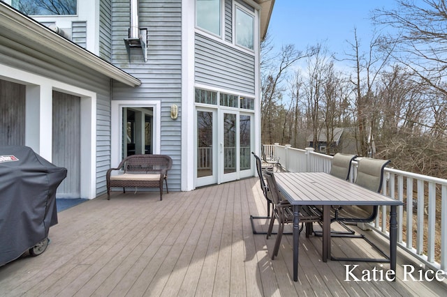 5575 Beechmont Rd, Whitehall, MI 49461 - deck featuring outdoor dining area and a grill