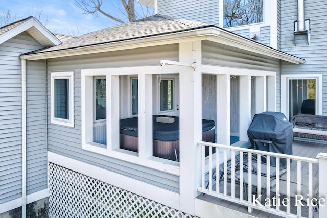 5575 Beechmont Rd, Whitehall, MI 49461 - view of side of property with roof with shingles and a hot tub
