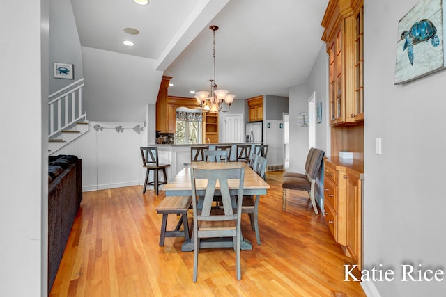 5575 Beechmont Rd, Whitehall, MI 49461 - dining room featuring recessed lighting, light wood-style floors, a notable chandelier, and stairway