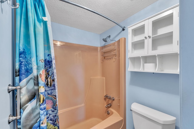 bathroom featuring shower / bath combination with curtain, a textured ceiling, and toilet
