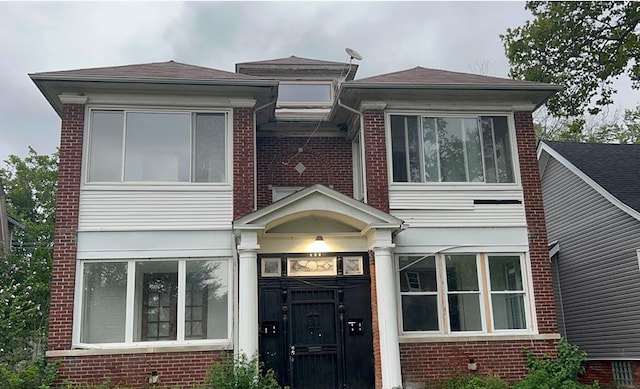 view of front of home with brick siding