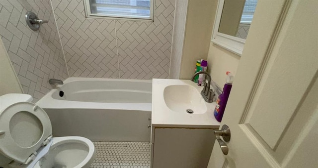 bathroom with vanity, tile patterned floors, shower / bath combination, and toilet