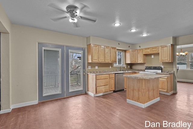 kitchen featuring range with electric cooktop, light brown cabinetry, stainless steel dishwasher, a center island, and a textured ceiling