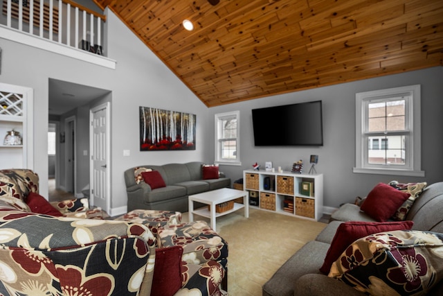 1219 Nokomis Dr, Gladwin, MI 48624 - carpeted living area featuring high vaulted ceiling, wooden ceiling, and baseboards