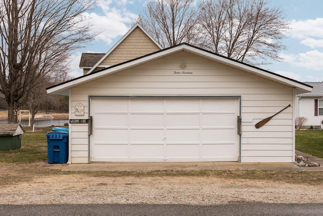 1219 Nokomis Dr, Gladwin, MI 48624 - garage featuring driveway