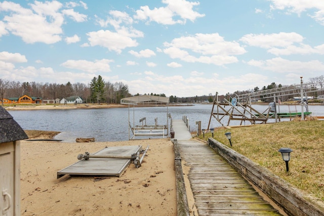 1219 Nokomis Dr, Gladwin, MI 48624 - view of dock with a water view and boat lift