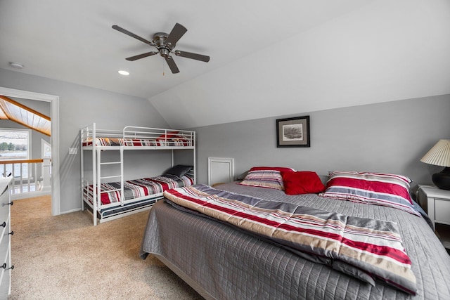 1219 Nokomis Dr, Gladwin, MI 48624 - carpeted bedroom featuring ceiling fan, vaulted ceiling, and recessed lighting