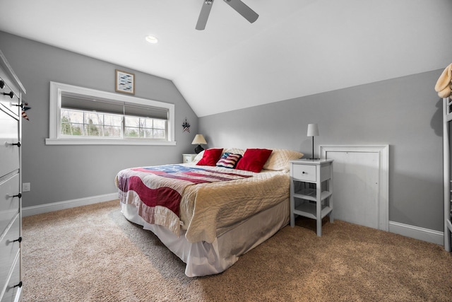 1219 Nokomis Dr, Gladwin, MI 48624 - carpeted bedroom featuring vaulted ceiling, baseboards, and ceiling fan