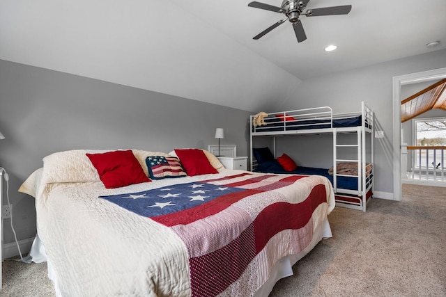 1219 Nokomis Dr, Gladwin, MI 48624 - carpeted bedroom with ceiling fan, baseboards, and vaulted ceiling