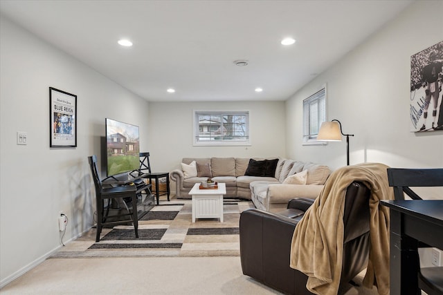 living area with recessed lighting and carpet floors