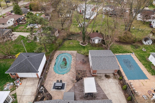 birds eye view of property with a residential view