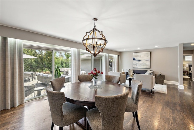 dining room with baseboards, an inviting chandelier, dark wood-type flooring, and recessed lighting