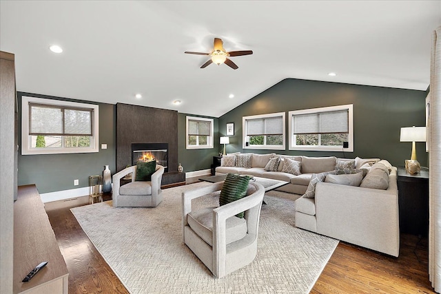 living room with recessed lighting, lofted ceiling, a healthy amount of sunlight, and ceiling fan