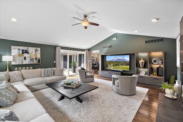 living room featuring high vaulted ceiling, ceiling fan, wood finished floors, and visible vents