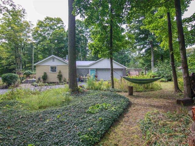 4760 Outer Dr, Grawn, MI 49637