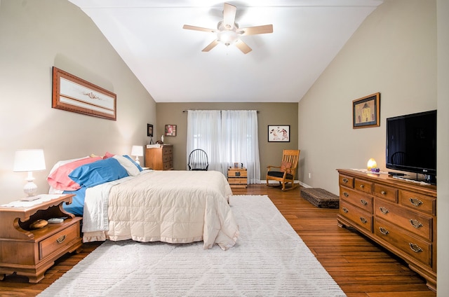 bedroom featuring vaulted ceiling, dark wood-type flooring, and ceiling fan