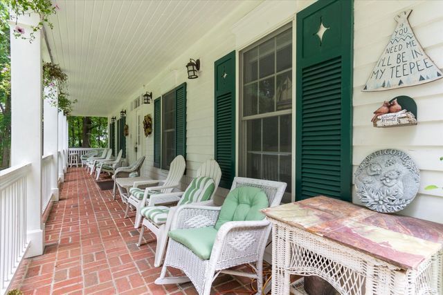 2457 Rocky Top Ln, Commerce Twp, MI 48382 - view of patio / terrace with a porch