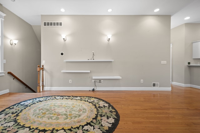 2457 Rocky Top Ln, Commerce Twp, MI 48382 - living room featuring wood finished floors, recessed lighting, and baseboards