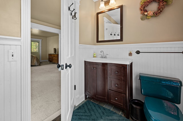 2457 Rocky Top Ln, Commerce Twp, MI 48382 - bathroom with wainscoting and vanity