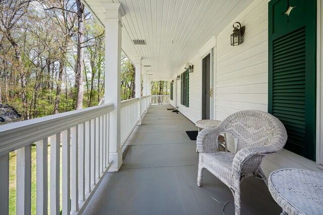 2457 Rocky Top Ln, Commerce Twp, MI 48382 - view of patio with covered porch