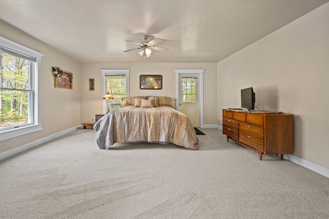 2457 Rocky Top Ln, Commerce Twp, MI 48382 - bedroom featuring baseboards, light colored carpet, and a ceiling fan