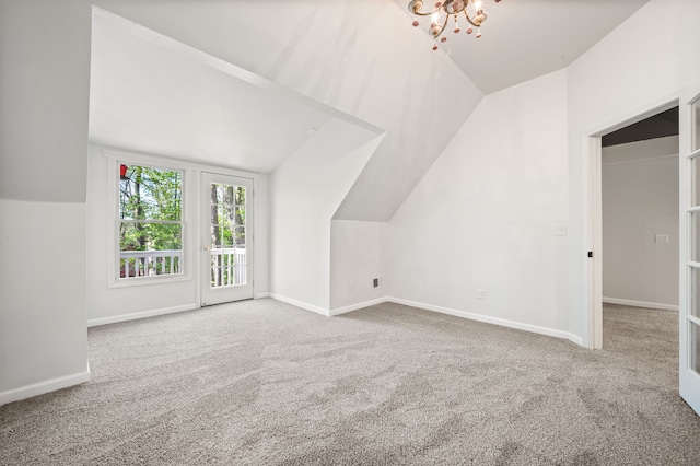 2457 Rocky Top Ln, Commerce Twp, MI 48382 - additional living space with lofted ceiling, carpet, and baseboards