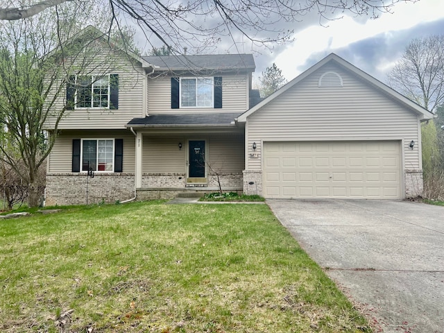 traditional home featuring brick siding, an attached garage, driveway, and a front lawn