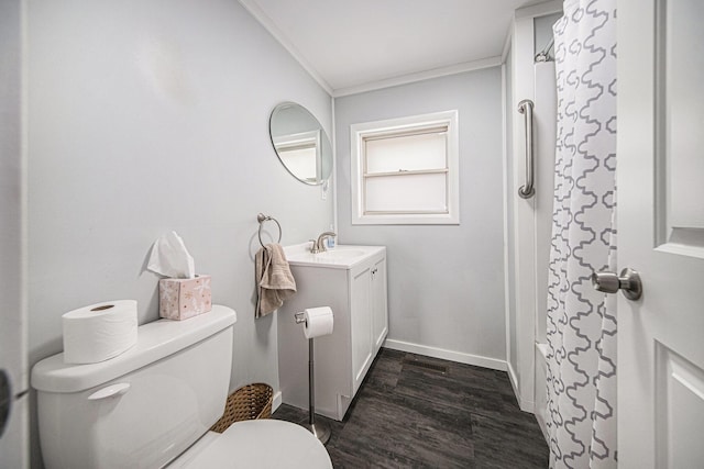bathroom featuring shower / bath combination with curtain, wood finished floors, toilet, vanity, and crown molding