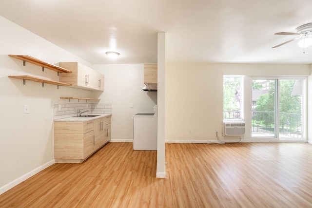 640 Virginia Park St, Detroit, MI 48202 - kitchen with tasteful backsplash, a sink, ceiling fan, light wood finished floors, and washer / clothes dryer