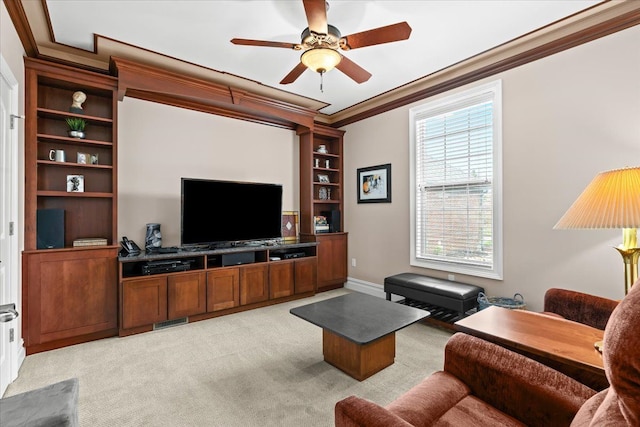 8427 Boulder Shores Dr, South Lyon, MI 48178 - living room featuring ornamental molding, light colored carpet, a ceiling fan, and baseboards