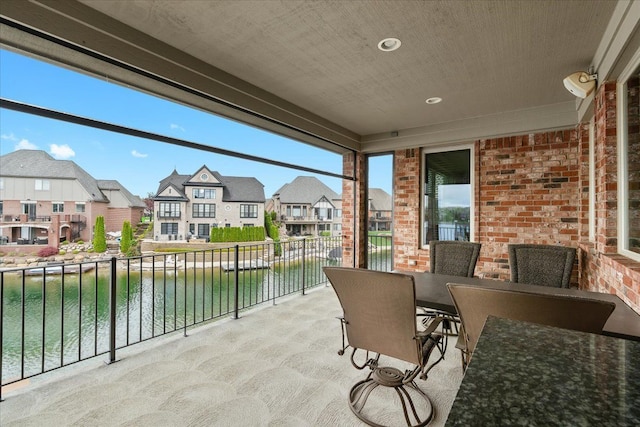 8427 Boulder Shores Dr, South Lyon, MI 48178 - balcony featuring a water view and a residential view