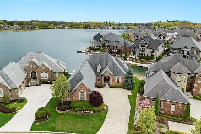 8427 Boulder Shores Dr, South Lyon, MI 48178 - aerial view of residential area featuring a nearby body of water