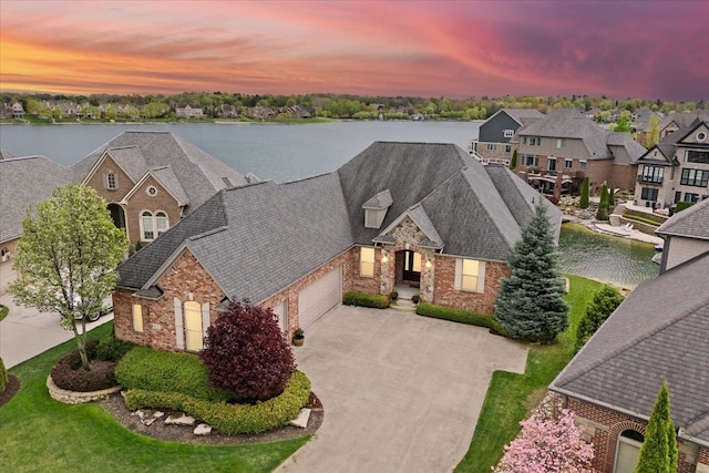 8427 Boulder Shores Dr, South Lyon, MI 48178 - aerial perspective of suburban area with a large body of water