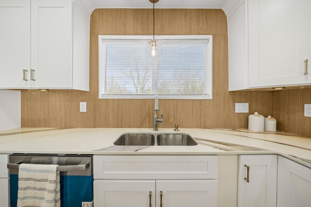 1525 Hiller Rd, West Bloomfield, MI 48324 - kitchen with a sink, wooden walls, white cabinetry, and dishwasher