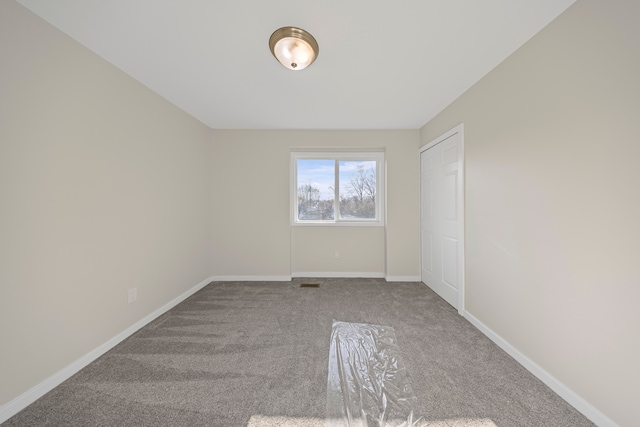 1525 Hiller Rd, West Bloomfield, MI 48324 - carpeted spare room featuring baseboards