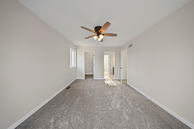 1525 Hiller Rd, West Bloomfield, MI 48324 - unfurnished bedroom with carpet floors, baseboards, visible vents, and ceiling fan