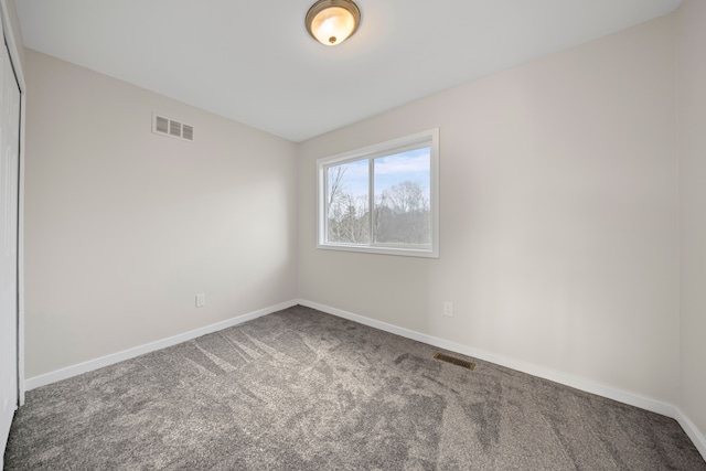 1525 Hiller Rd, West Bloomfield, MI 48324 - empty room featuring baseboards, carpet, and visible vents