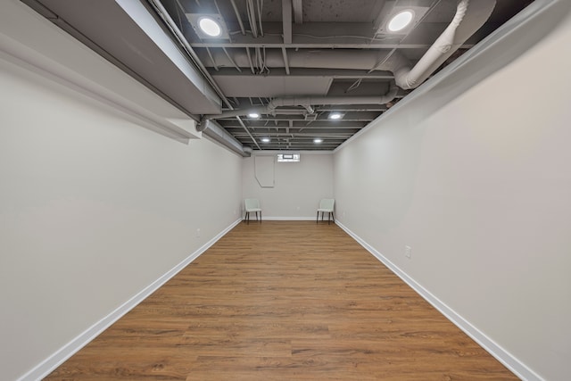 1525 Hiller Rd, West Bloomfield, MI 48324 - finished basement with baseboards and wood finished floors