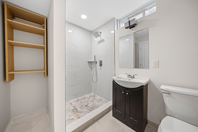 1525 Hiller Rd, West Bloomfield, MI 48324 - bathroom featuring vanity, a marble finish shower, baseboards, and toilet