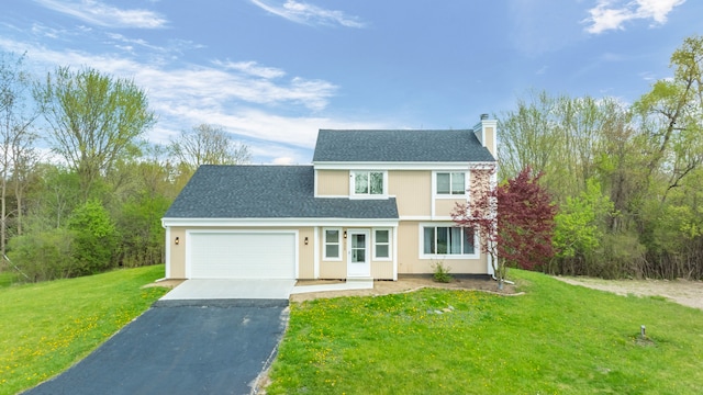 1525 Hiller Rd, West Bloomfield, MI 48324 - traditional home with a front lawn, stucco siding, a chimney, an attached garage, and driveway