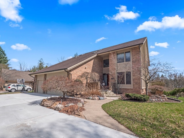 view of front of property featuring a garage, brick siding, a front yard, and concrete driveway